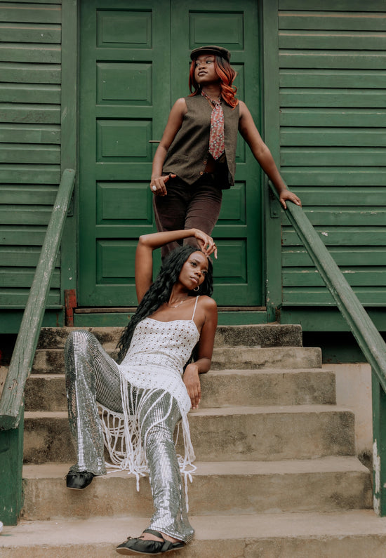 A couple of people that are standing on some steps
