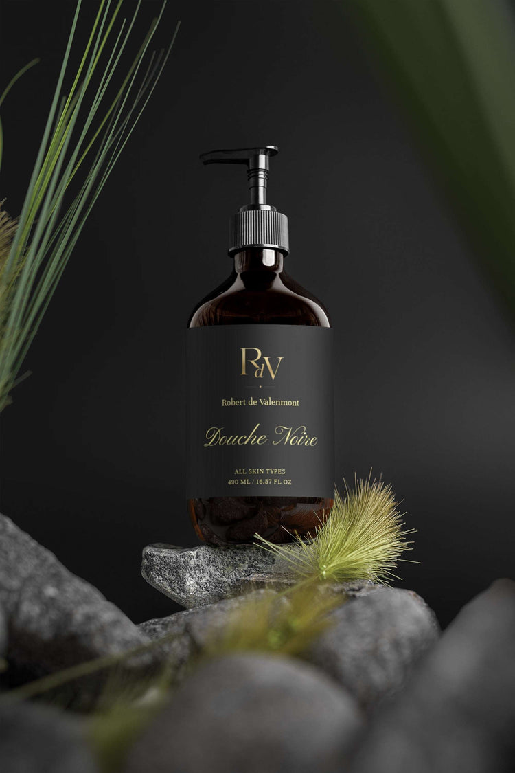 Duschgel Douche Noire von Robert de Valenmont, dunkle Flasche mit schwarzem Design, auf weißem Hintergrund.
