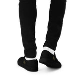 Schwarze Herren-Canvas-Schuhe von Robert de Valenmont mit Schnürverschluss, Blick auf die Rückseite.