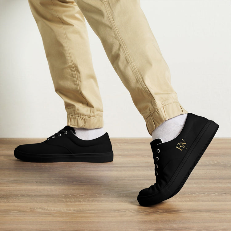 Schwarze Canvas Schuhe von Robert de Valenmont mit Schnürung, Frontansicht, modisch und bequem für Männer.