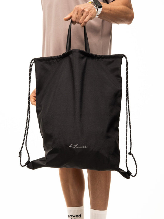 Schwarzer SL-150 Shopper von Next Level mit Rucksackfunktion und reflektierendem Logo für Alltag und Reisen