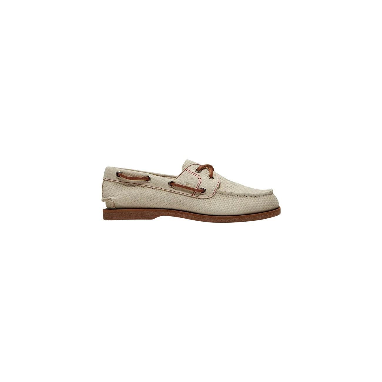 Timberland Damme Mokassins in brown leather, featuring a classic moccasin design and comfortable slip-on style.